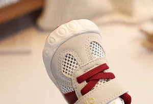 Detail of toddler mesh shoes featuring breathable fabric and hook-and-loop closure