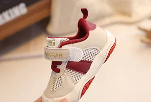 Detail of baby sneakers featuring breathable mesh upper and durable anti-slip rubber soles