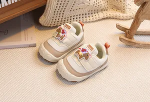 Detailed macro shot of baby walking shoes with soft soles and velcro strap
