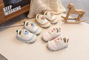 Detailed view of toddlers shoes with anti-collision toe and secure hook-and-loop closure