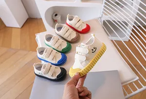 Kids canvas sneakers in five colors with velcro straps and smile face detail