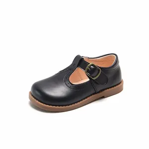 Chaussures Mary Jane noires classiques pour filles avec détails brogues et bride en T
