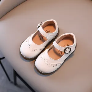 Classic white girls' Mary Jane leather shoes with Brogue detailing and T-strap metal buckle
