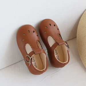 Retro brown hollow-out Mary Jane shoes for toddler girls with vintage T-strap design