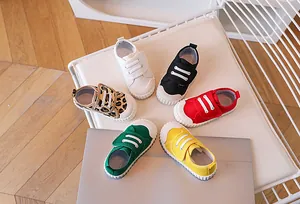 Kids classic canvas sneakers with velcro straps in six vibrant colors and rubber toes