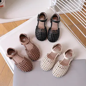 Kids woven sandals in black brown and cream with vintage hollowed design and velcro straps