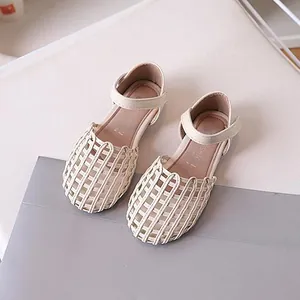 Retro cream woven sandals for girls with hollow mesh design and secure velcro straps