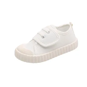 Classic white children's canvas shoes with anti-collision toe and velcro straps