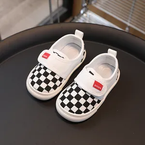 Kids black and white checkered canvas shoes with velcro strap and non-slip rubber sole