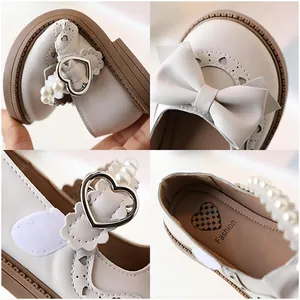 Girl's white pearl princess shoes with bow and heart buckle in multi-angle view