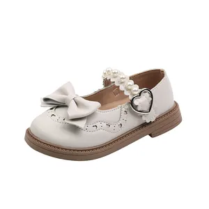 Girl's Mary Jane leather shoes with pearl strap and bow detail in beige white