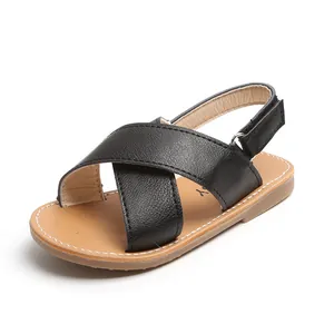 Classic black leather children's Roman sandals with soft soles and velcro straps