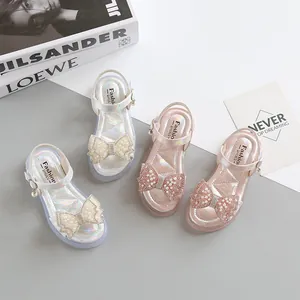 Girls princess sandals with shiny bows and pearls in silver and pink colors