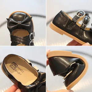 Girls black Mary Jane shoes with bow, flexible rubber sole, soft patent leather design