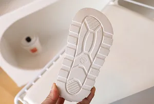 Detail view of anti-slip rubber sole with size 25 marking for children sandals