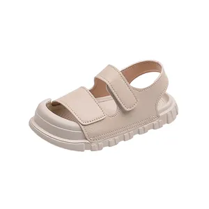 Kids closed-toe summer sandals in beige faux leather with non-slip thick rubber soles