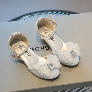 Silver girls princess dress shoes with pearl bow and sparkling rhinestone detail