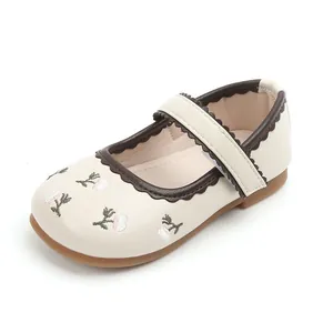Girls beige Mary Jane flat shoes with floral embroidery and brown wavy trim detail