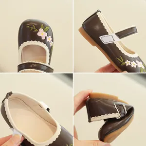 Floral embroidered girls Mary Jane shoes with flexible sole and velcro strap closure