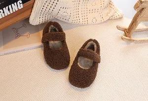 Detail of dark brown plush Mary Jane flat shoes for toddlers with cozy fleece lining