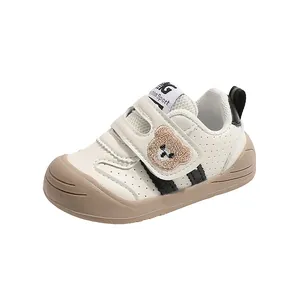 Cream baby walker shoes with teddy bear embroidery and breathable synthetic leather material