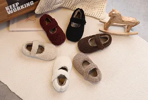 Flat lay of colorful plush Mary Jane toddler shoes with fleece lining for autumn and winter