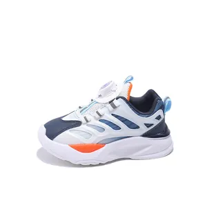 Kids sports shoes with breathable mesh and rotating dial lace system in blue and orange