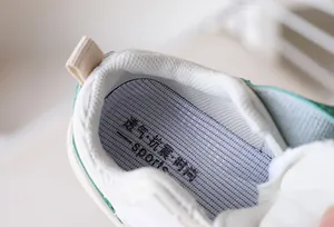 Detail of breathable mesh insole with shock absorption for toddler walking shoes