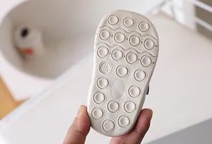 Detail of baby walking shoes non-slip rubber sole with size 17/135 marking