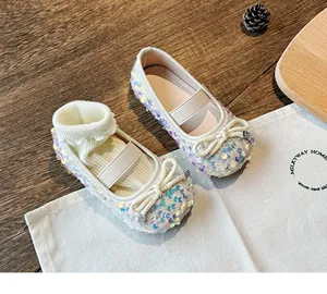 Detail of sequins Mary Jane shoes with bowknot and elastic strap for girls
