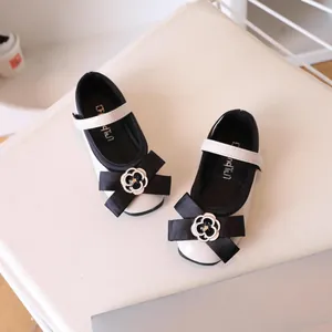 French style girls Mary Jane shoes with black bow and camellia flower ornament