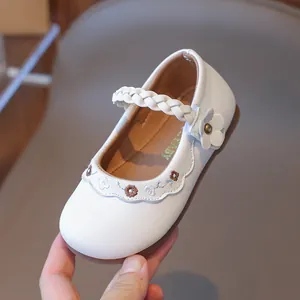 White Mary Jane shoes for girls with floral embroidery and braided flower strap