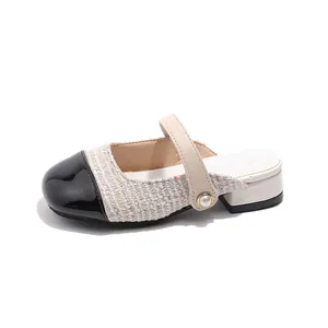 Girls' tweed Mary Jane mules with black patent leather toe and pearl button detail