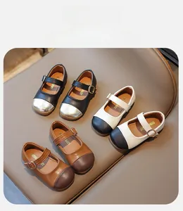 Three pairs of Mary Jane shoes in black gold, beige black, and brown with metal buckles