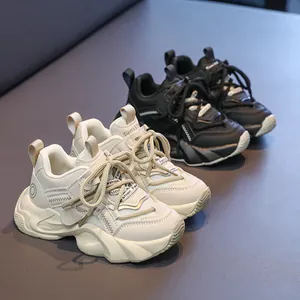 Kids chunky sneakers 2025 in beige and black featuring breathable mesh and soft soles