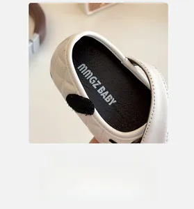 Detailed macro view of soft inner lining and quilted pattern on white girls princess shoes
