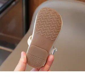 Detail of soft non-slip rubber sole with wave pattern for girls princess shoes