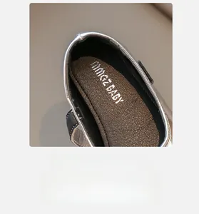 Close-up of the breathable brown leather lining on these silver sequin girls shoes