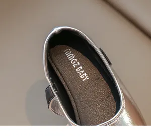 Detailed top view of shiny silver sequins and soft leather insole for kids princess shoes