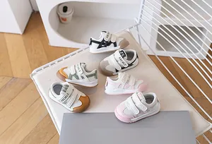 Detail of toddler mesh sneakers showing breathable material and secure velcro straps