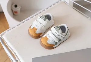 Detailed macro view of breathable mesh toddler shoes with secure velcro closure