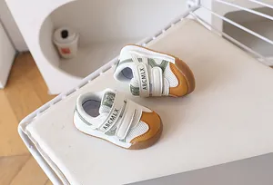 Detailed view of breathable mesh baby walking shoes with anti-slip rubber soles