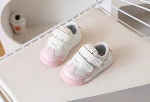 Detail view of pink breathable mesh toddler shoes with double hook-and-loop straps