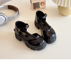 Details von Mädchen Lackleder Mary Janes in Schwarz mit Gold-Schnalle und dicker Gummisohle