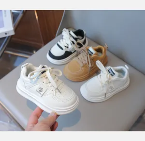 Detail of colorful children's sneakers with thick non-slip soles and breathable faux leather