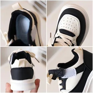 Kids black and white panda sport sneakers with breathable holes and velcro strap