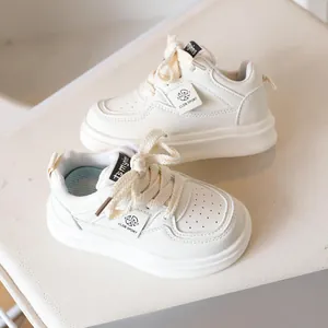Classic white children's sports sneakers with breathable toe and thick anti-slip sole