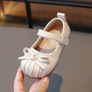 Beige Mary Jane princess shoes for girls with elegant bow and pleated texture