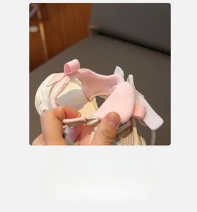 Detail of breathable pink mesh lining and soft interior of children sport sandals