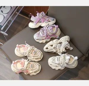 Detailed view of breathable hollow mesh design on various colors of kids sport sandals